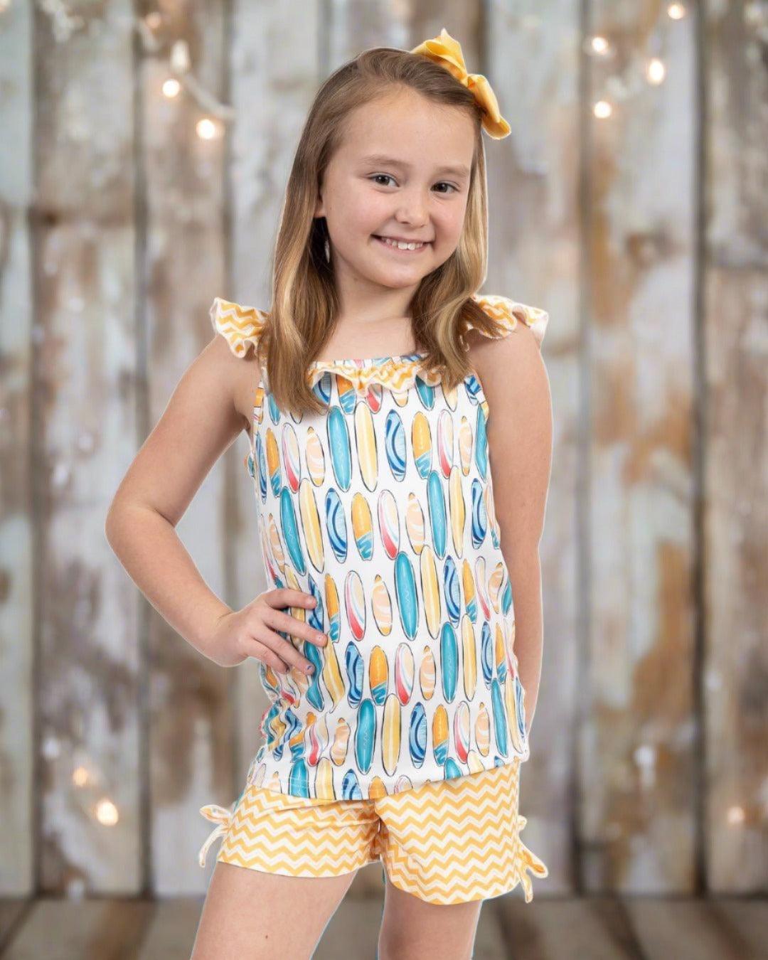 "SURF AND SUN" Two-piece outfit.